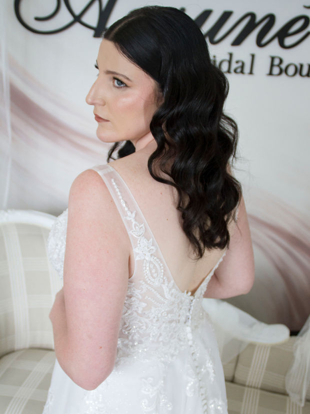 Sparkling plus-size wedding gown with a V-neckline, plunging beaded bodice, soft tulle skirt, and long train – Odette, a fairytale bridal dress.