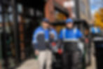 Two MDLDC Ambassadors with their cleaning cart while out on Broadway maintaining the area