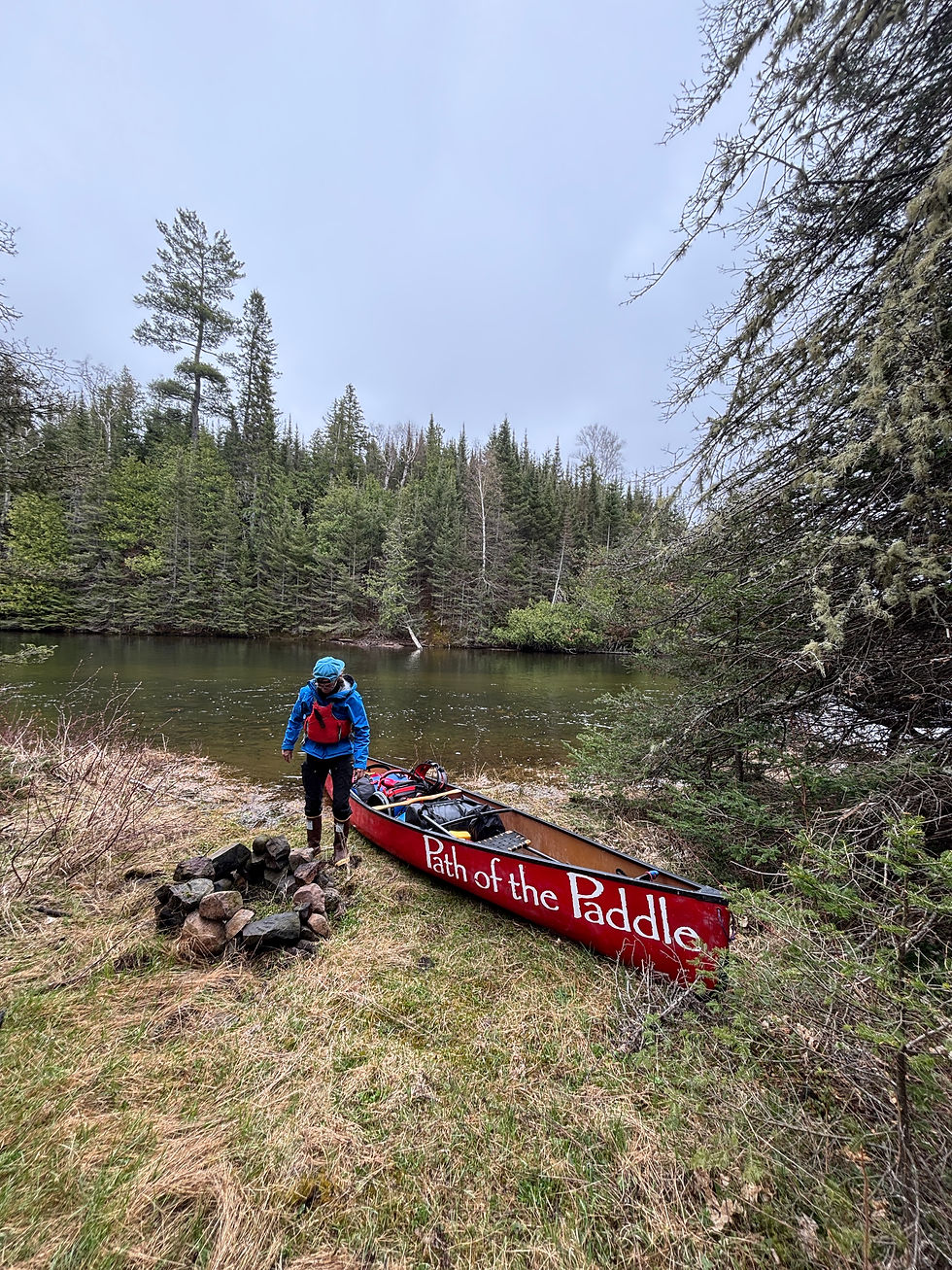 Fixing up the fire pit entering Rose Lake