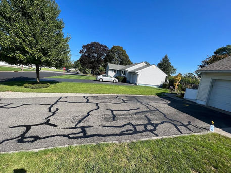 Driveway crack repair before seal coating NJ