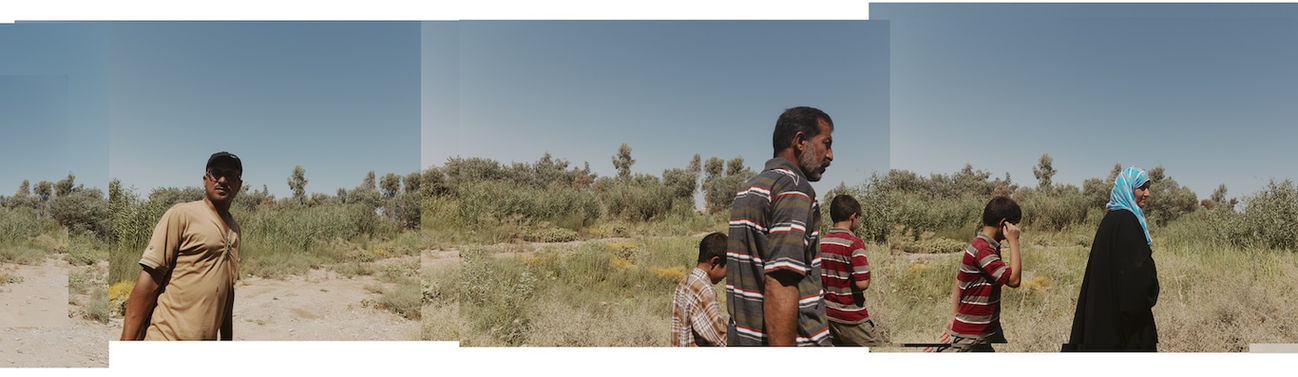 Panoramic image of Iraqi people walking on the street in Iraq
