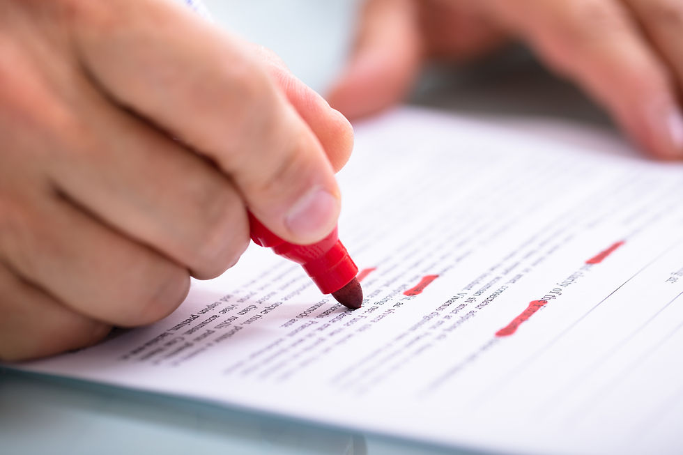 A photo of a lawyer redlining a contract