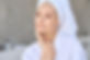Senior woman admiring beautiful skin at Day Spa