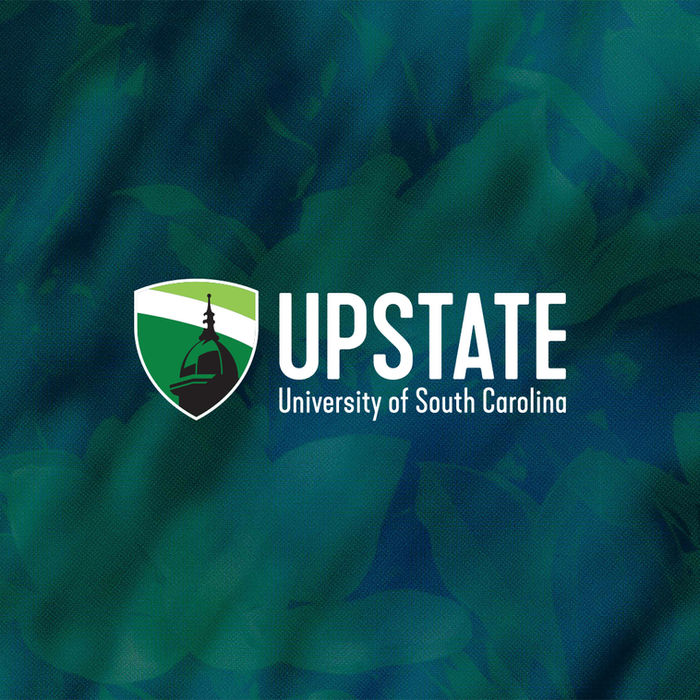 USC Upstate logo over floral background.