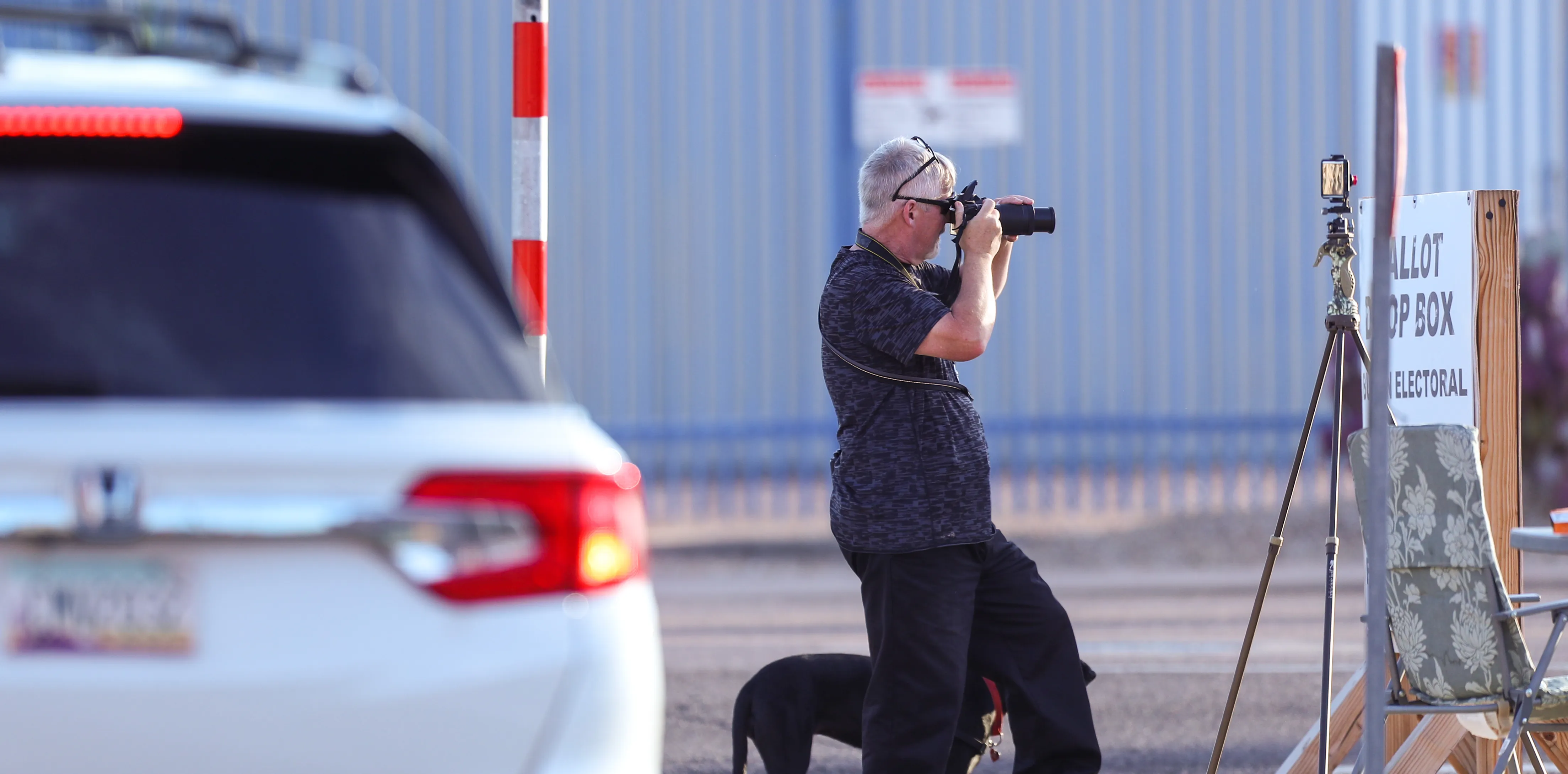 Person Taking Photo of Arizona Drop Box