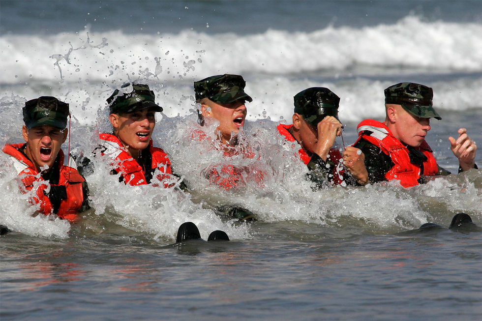 US Navy SEALs in the surf at BUDS