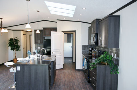 Black kitchen counter and cabinets