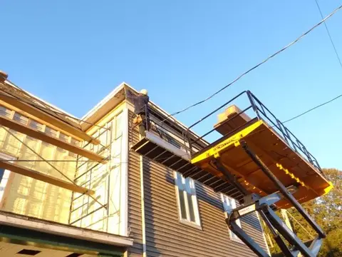 An elevator in front of a house