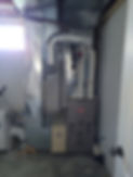 A picture of a furnace installed on a property.