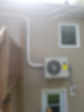 A picture of a ductless air conditioning system newly installed on a property.