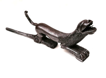 Iron door knocker with the leopard, the symbolical representation of Charles V, 16th century. Masterpiece of the Urbano Quinto Heritage Collection.