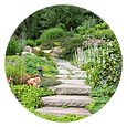 Circular image of stone pathway in a beautiful garden