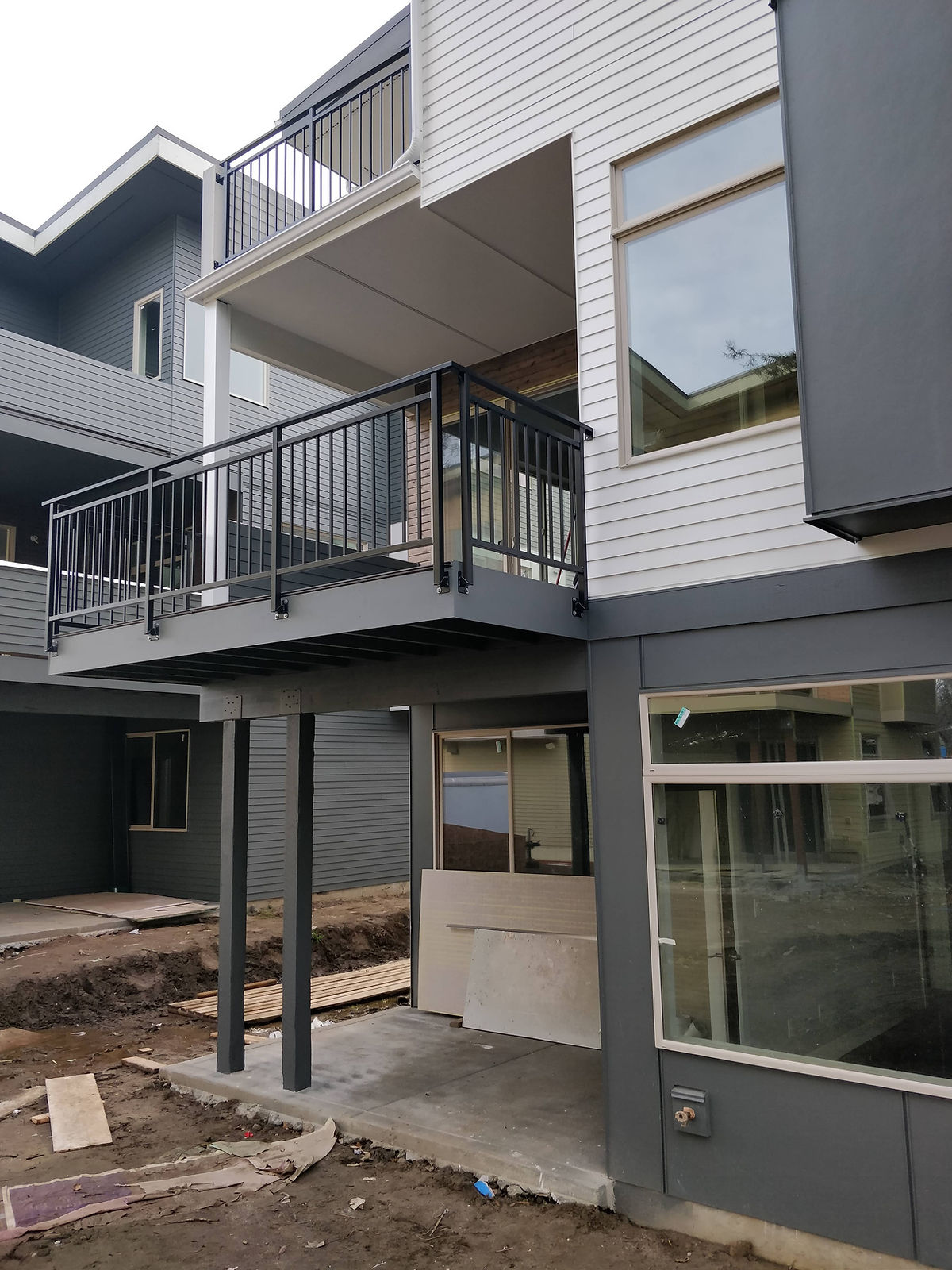 Upper deck and balcony steel railings with vertical pickets — Seattle, WA — view 2
