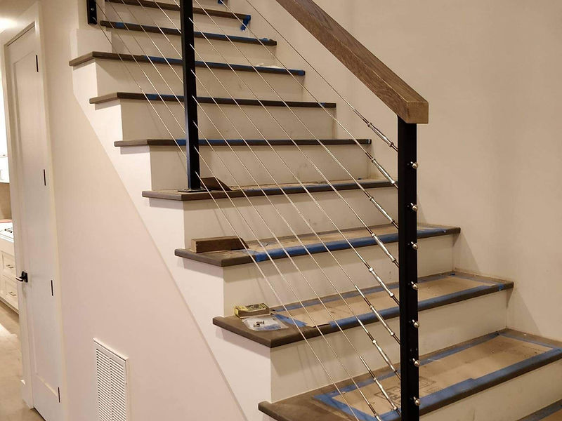 Wood and steel cable stair railings in Bellevue, WA