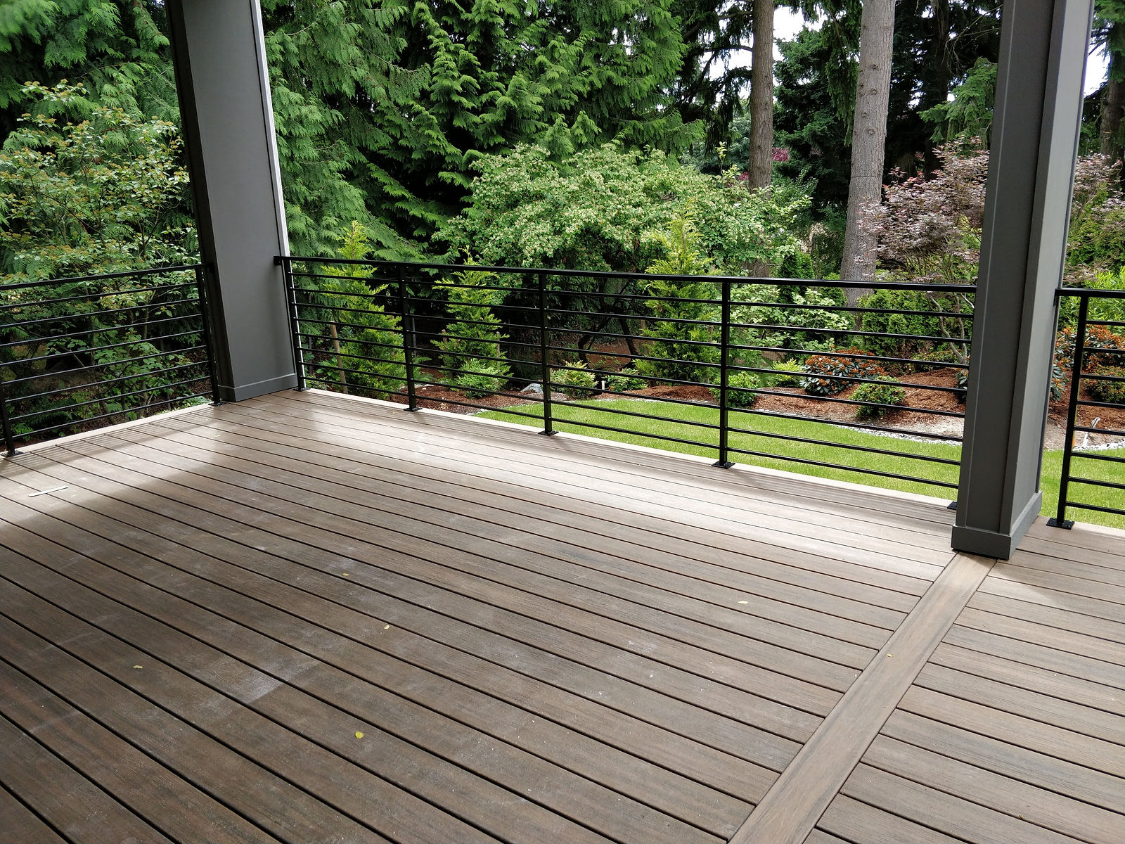 Exterior steel deck rails with thin horizontal bar infill. — view 7