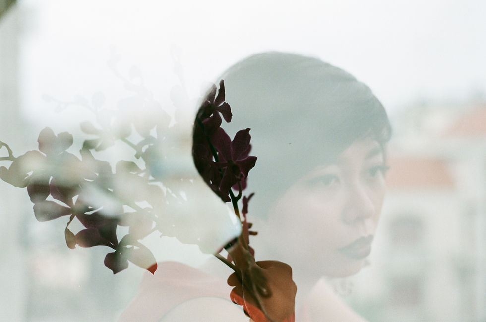 Pajaro Pequeño: Múltiple Exposure with Leila and the orchids. This photo was taken when I met Leila in Saigon, and we were trying to match our way to visualize moments.