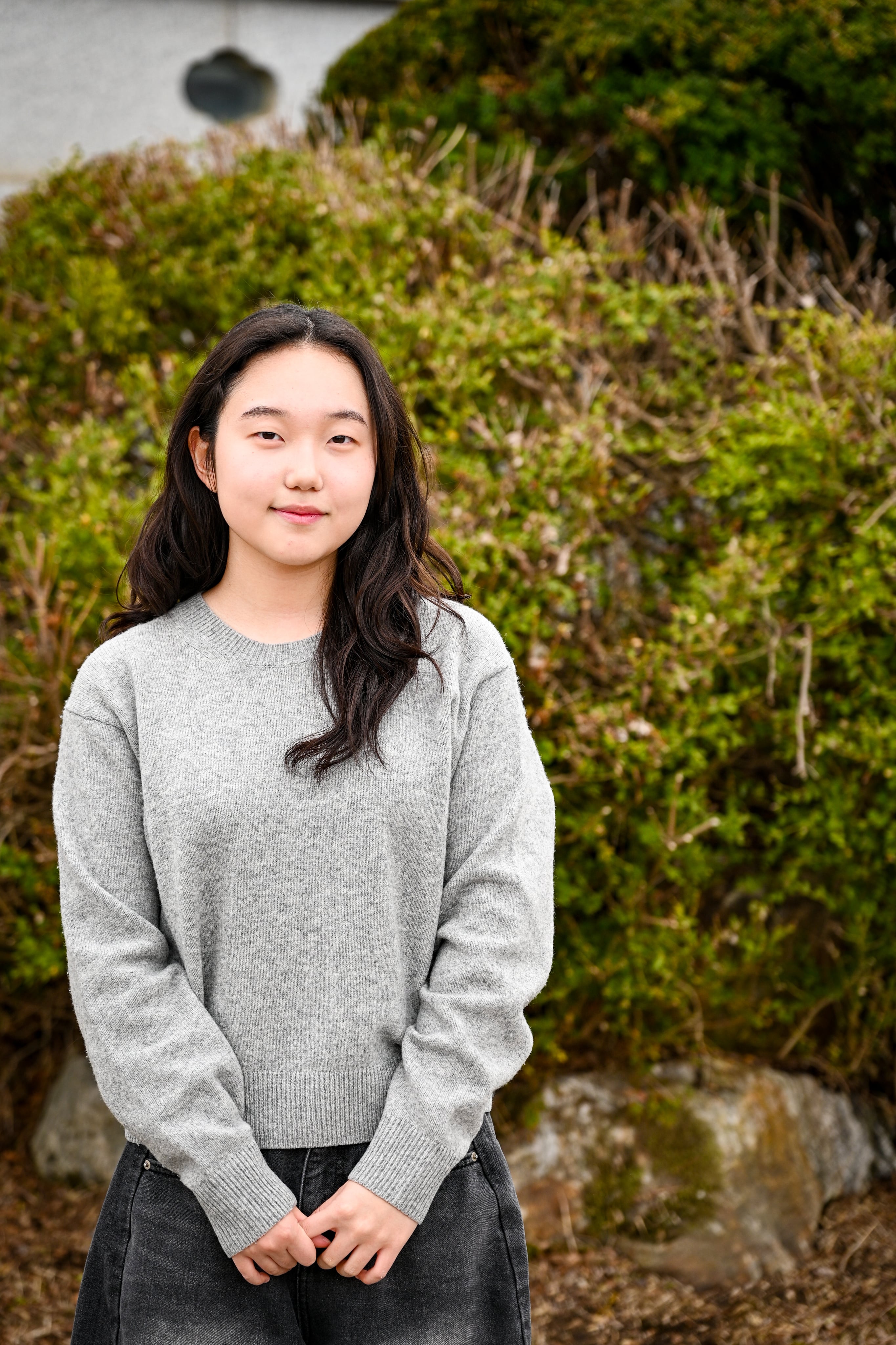 Portrait of Dohui Kim outdoors