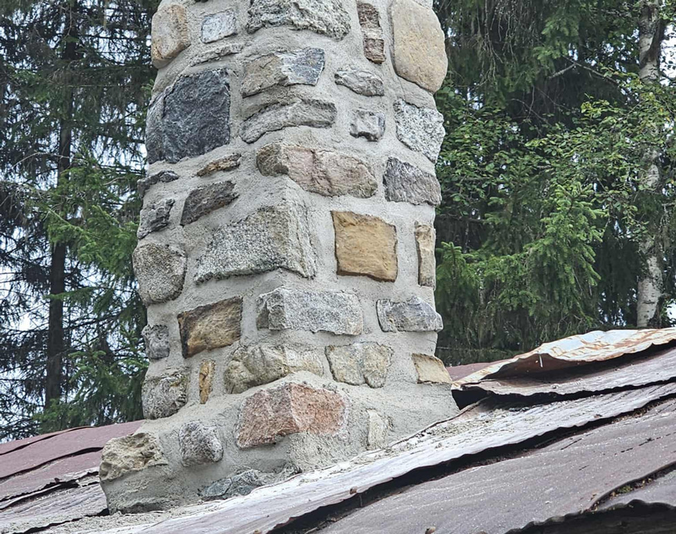 antikvarisk muring av naturstein i eldre bygg