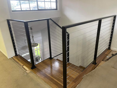 Black powder coat square post wire balustrade installation indoor staircase residential interior Highton, Victoria