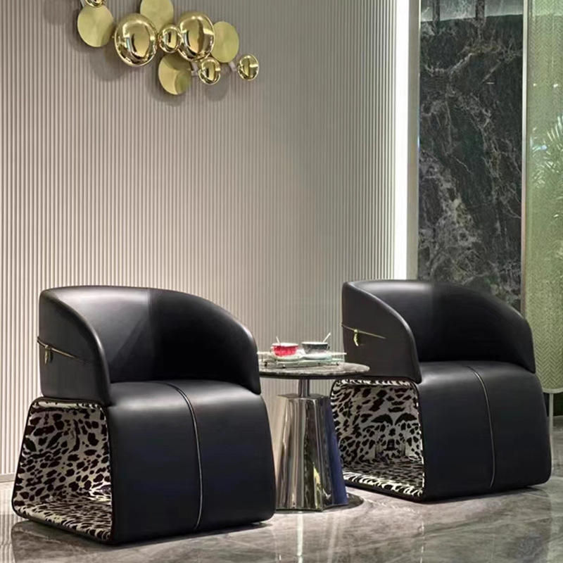 Black Leather Accent Chair with Leopard Print Detail and Gold Zipper Accent