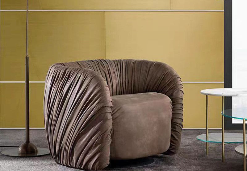 Brown Pleated Fabric Accent Chair with Curved Barrel Back and Plush Seat