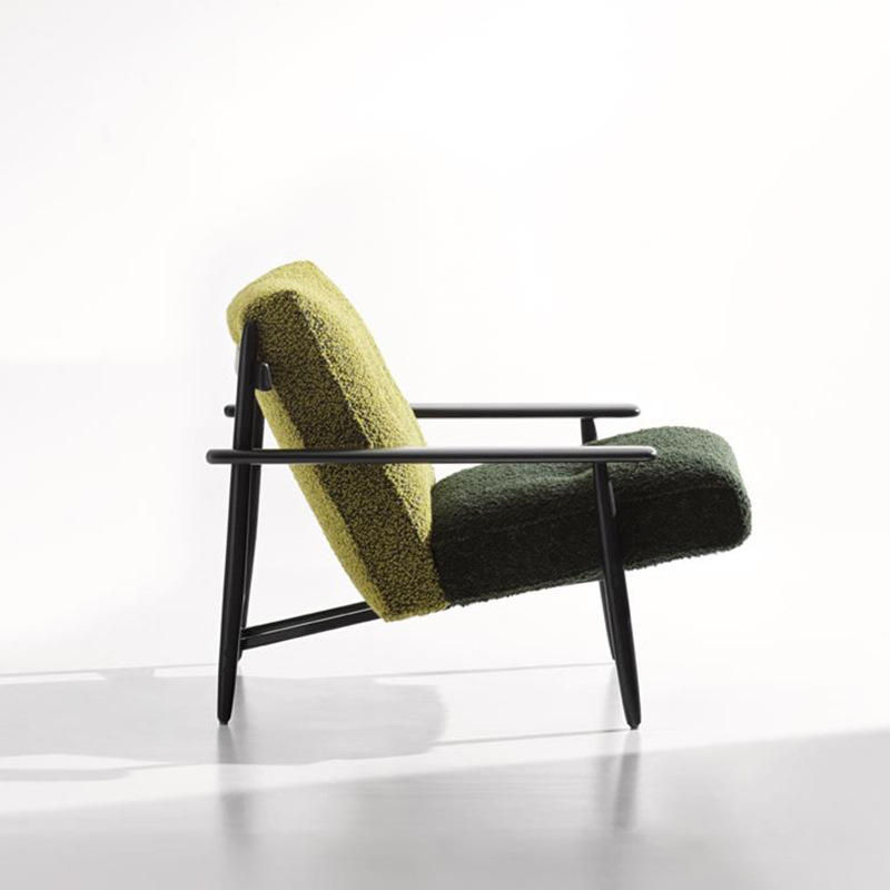 Green Boucle Accent Chair with Black Metal Frame and Modern Lounge Design
