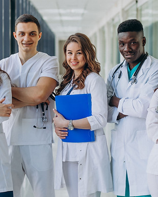 team-of-young-specialist-doctors-standin