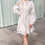Miniatura: Vestido de encaje blanco corto con manga larga