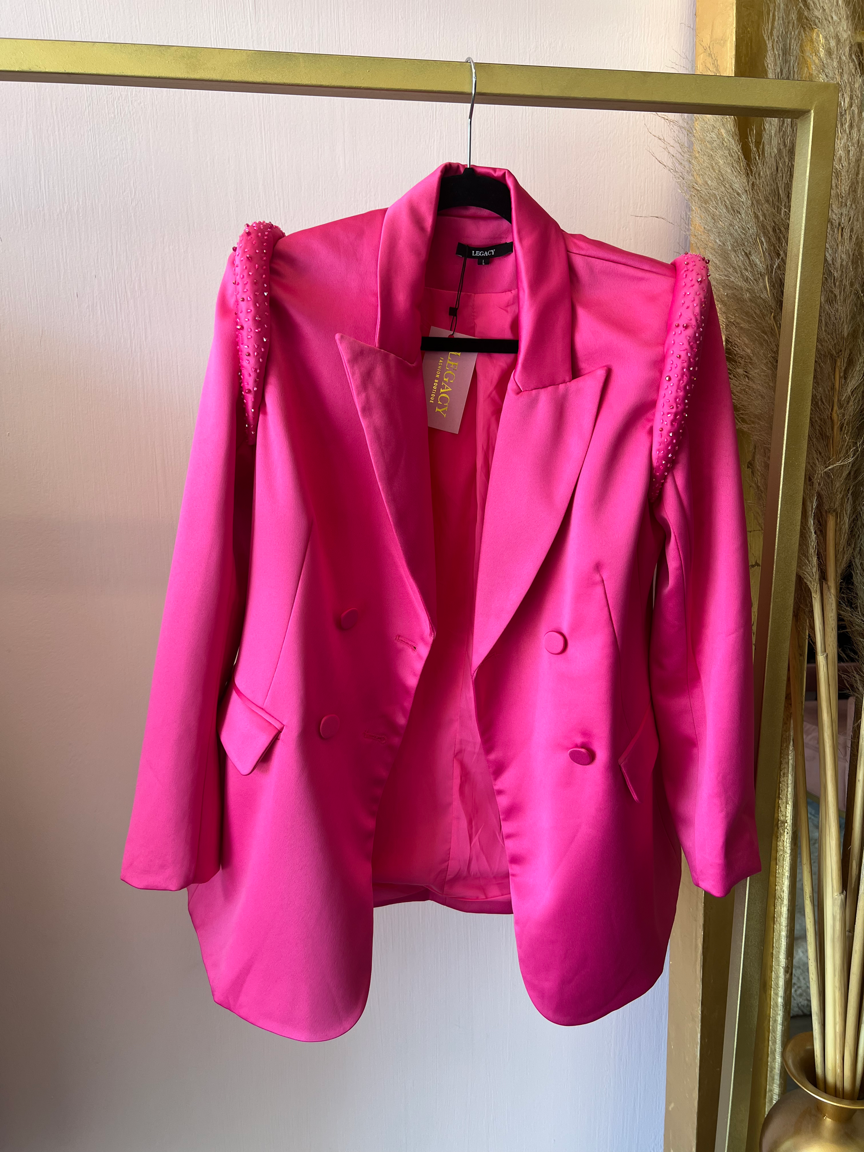 Blazer fucsia manga larga con piedras