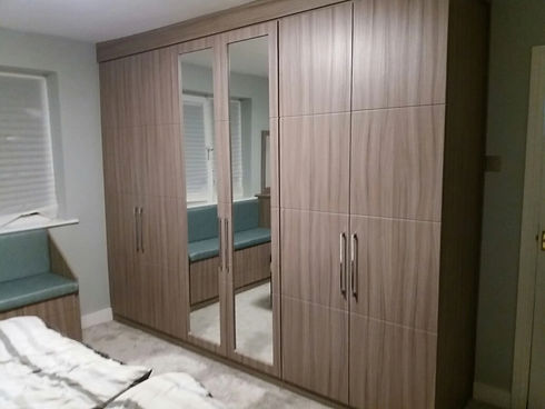 Bespoke wooden fitted cupboard