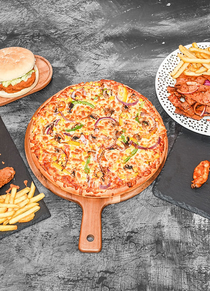 A range of sams fast food - pizza, chicken burger, fried chicken and chips and donner and chip on a plate