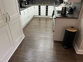 Brown hardwood flooring in kitchen