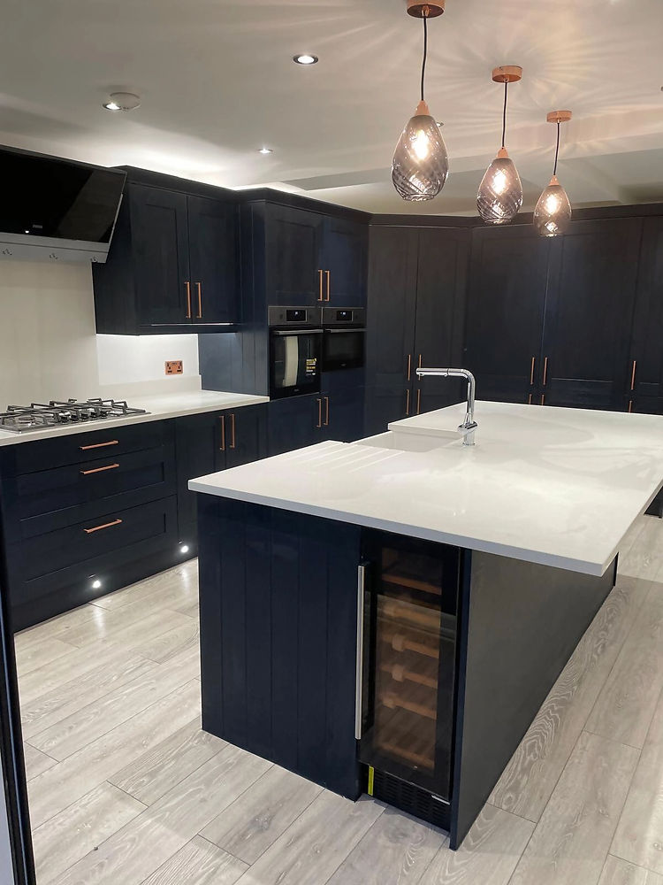 Picture of a navy blue and white kitchen