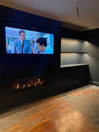 Media wall image with fireplace, storage and fireplace
