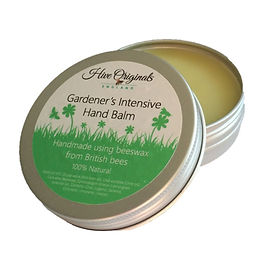 Hive Originals Gardener's Intensive Hand Balm, open aluminium tin of pale balm with a green grass and clover label