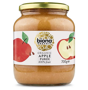 Biona Apple puree in a clear glass jar with a gold lid.