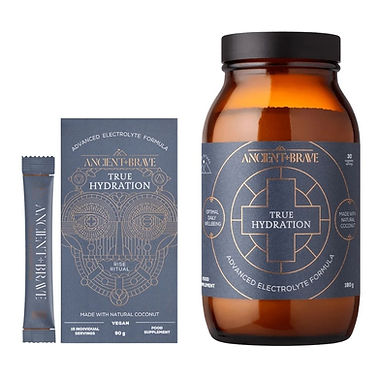 Brown bottle and two blue packets labeled "Ancient + Brave True Hydration" with intricate designs and text about natural ingredients.