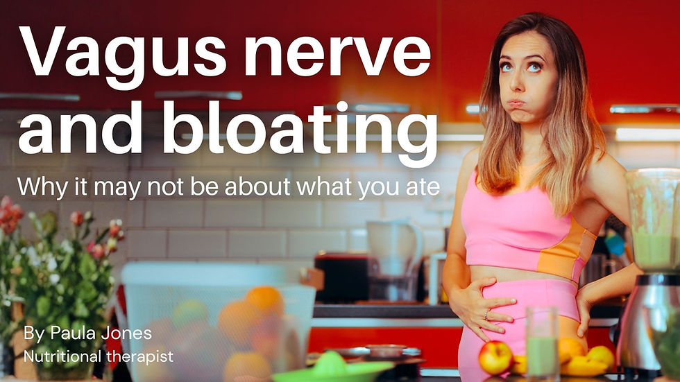 Woman in pink athletic wear stands in a kitchen, holding her stomach; text reads Vagus nerve and bloating, by Paula Jones.