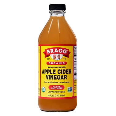 Bragg Organic Apple Cider Vinegar with the Mother raw unfiltered glass bottle on a white background