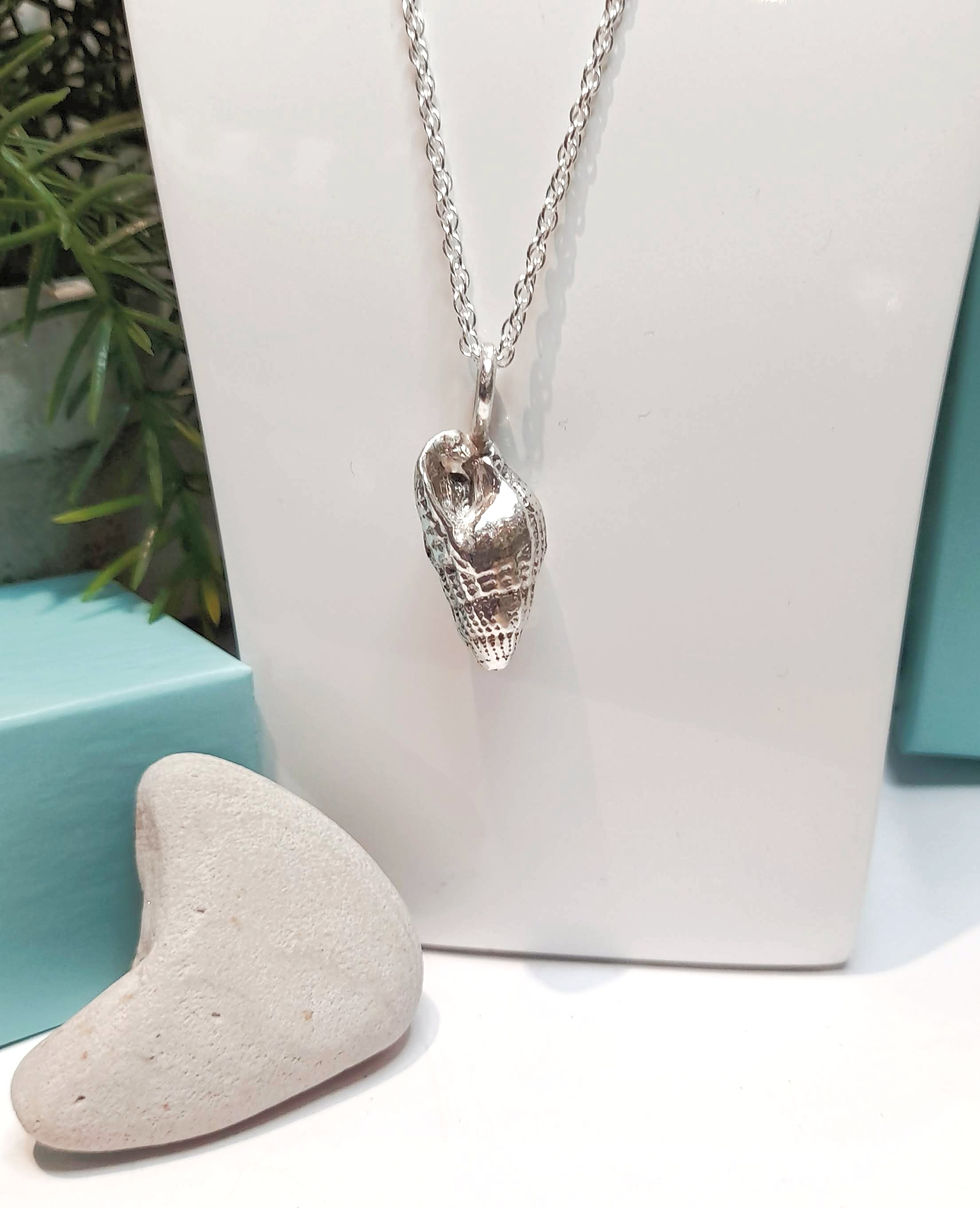 Thumbnail: Hand Cast Sea Shell Pendant