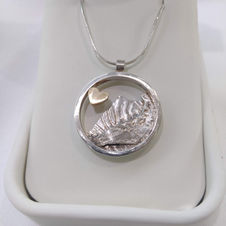textured sterling silver, 9ct gold ashes in silver memorial pendant