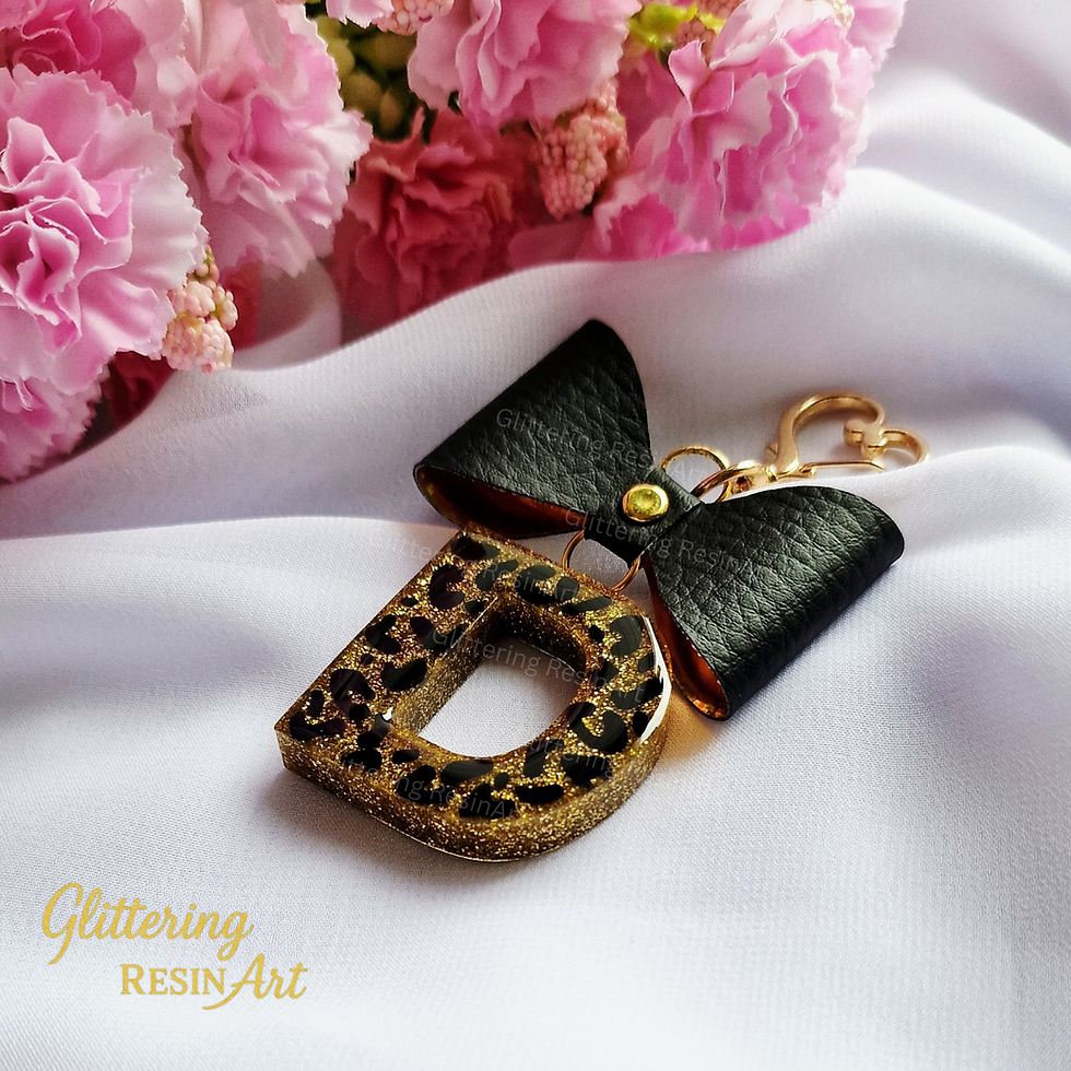 Thumbnail: Personalized leopard print resin initial keychain with gold-tone keyring, stylish and handmade.