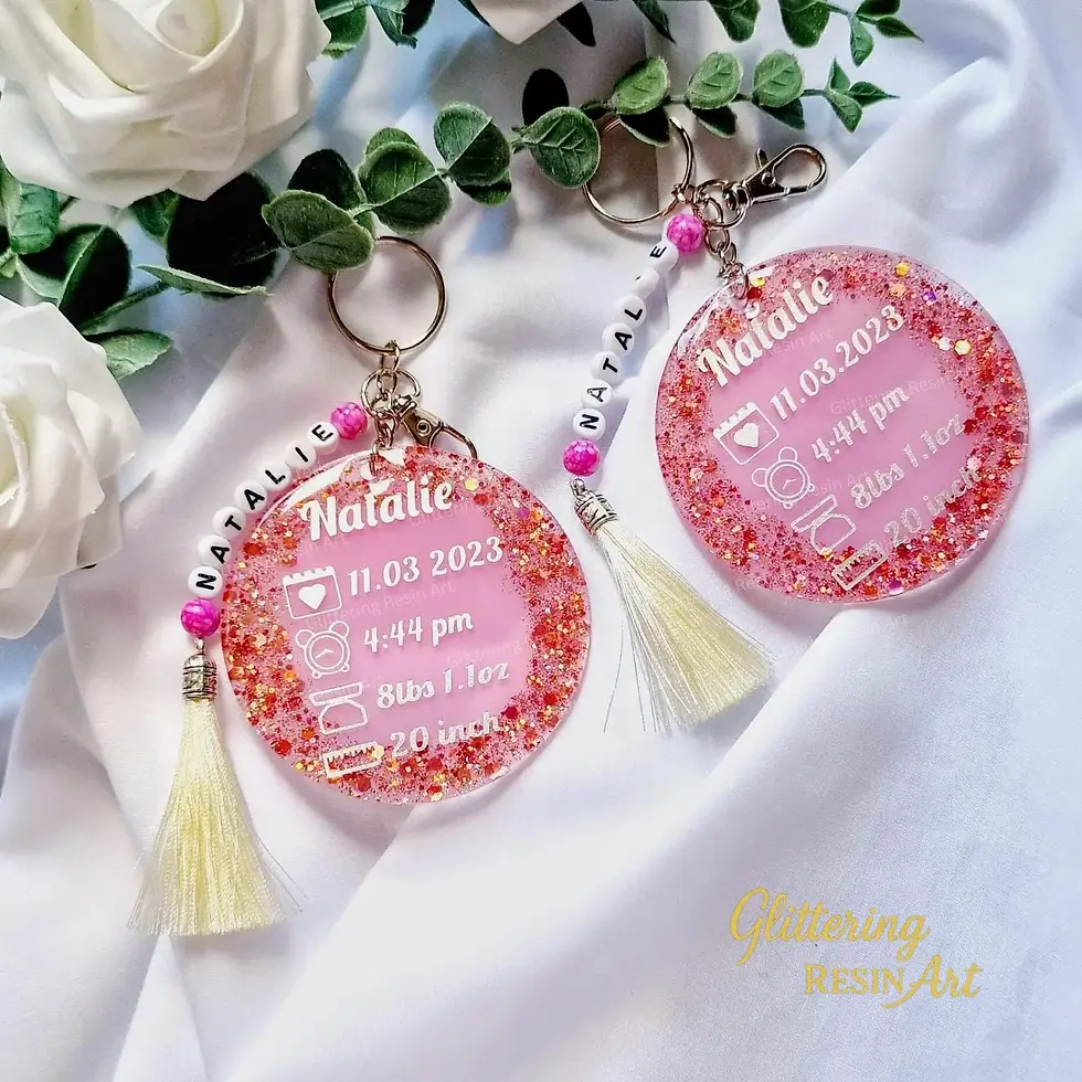 Personalized round resin keepsake keychain with baby birth stats, custom newborn memory gift in circular design.