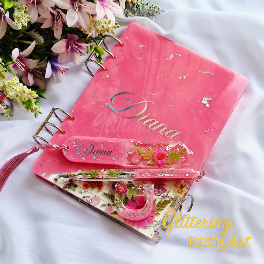 Thumbnail: Rose Pink personalised resin journal with matching refillable pen, bookmark, and keychain set.