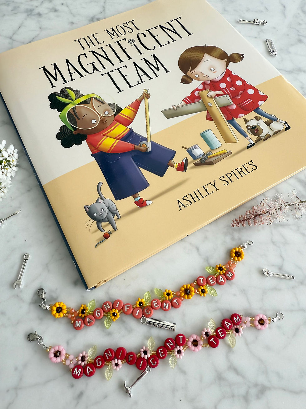 Thumbnail: The Most Magnificent Team signed book and set of matching bracelets