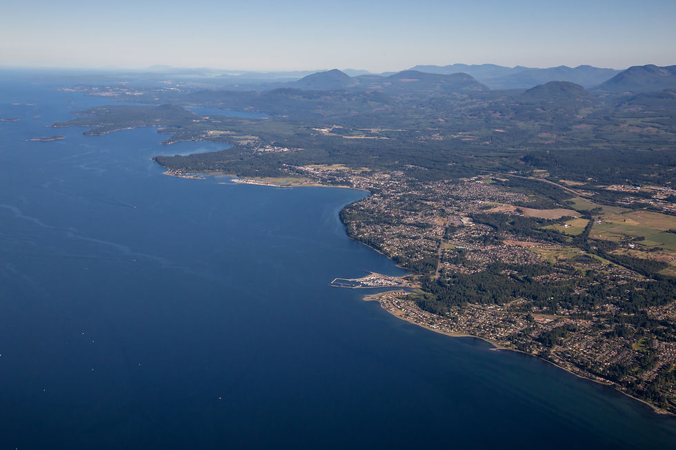 Aerial view of Qualicum Beach, BC where Osprey Electric serves electrical, solar, and generator clients