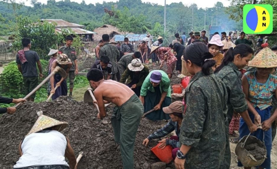 Departmental authorities and local residents jointly repairing the Sinswelya (Chakma) village road in Buthidaung Township.