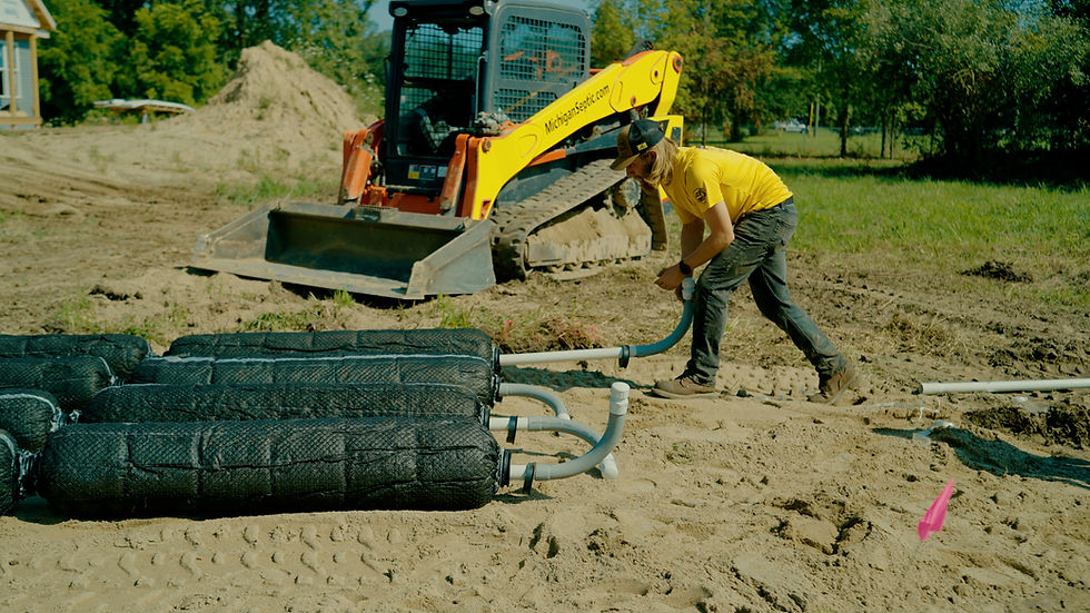Mound septic system installation by Michigan Septic in Mason, MI, showcasing a low-profile design to reduce mound septic system cost for local homeowners.