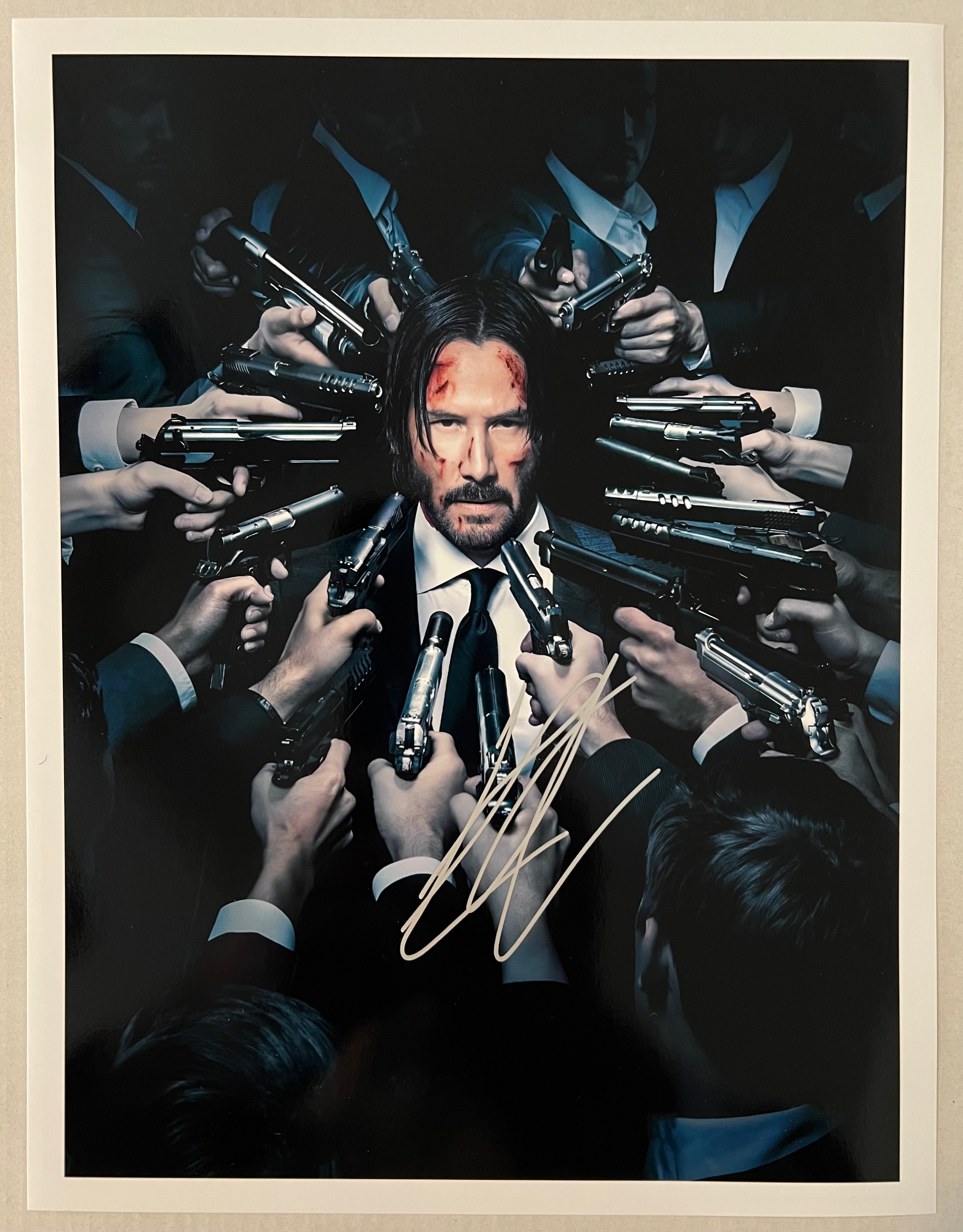 Keanu Reeves signed 8.5"x11" "John Wick" photo. 1671191