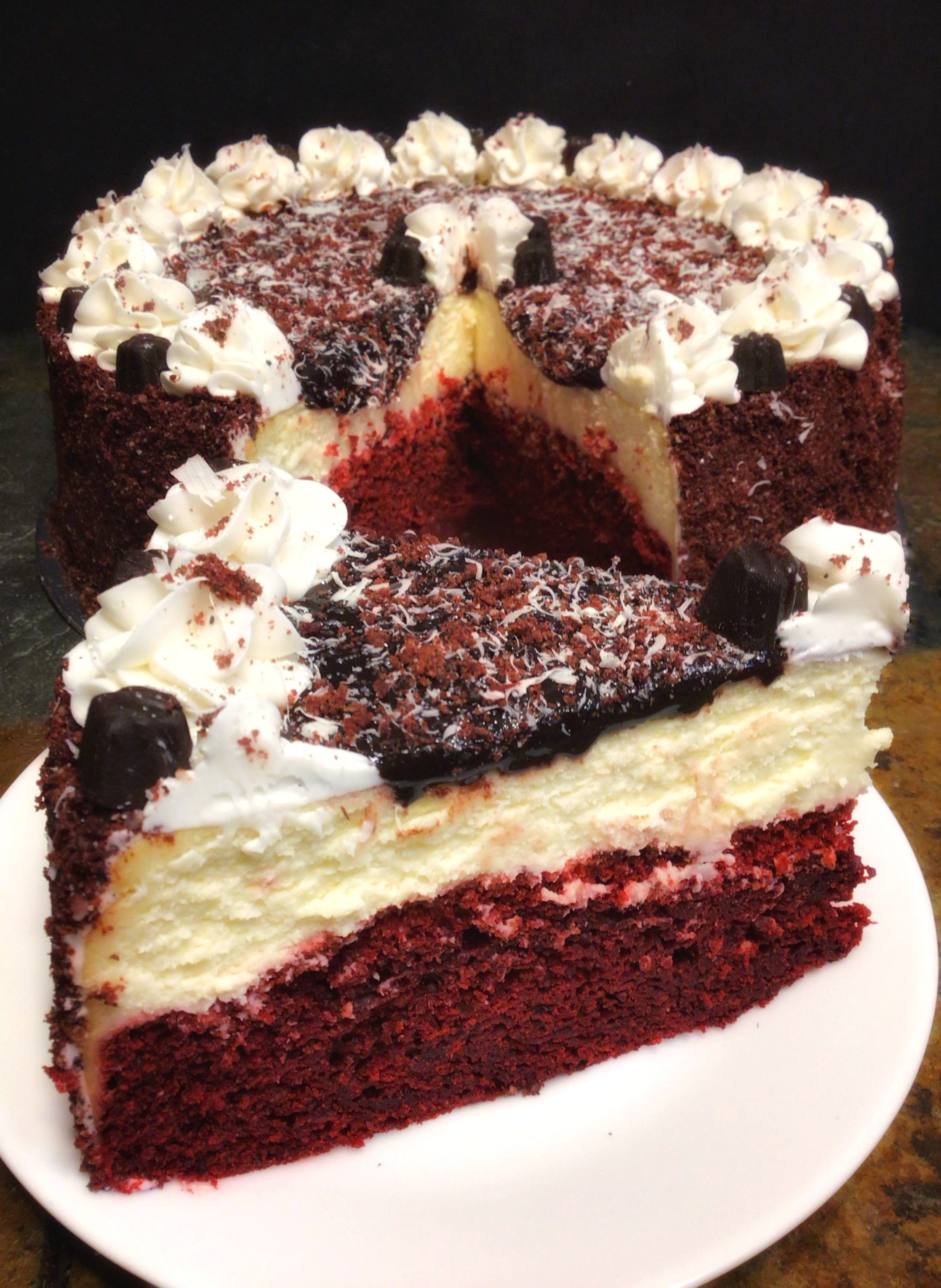 Red Velvet “Stacked Temptation” Cheesecake